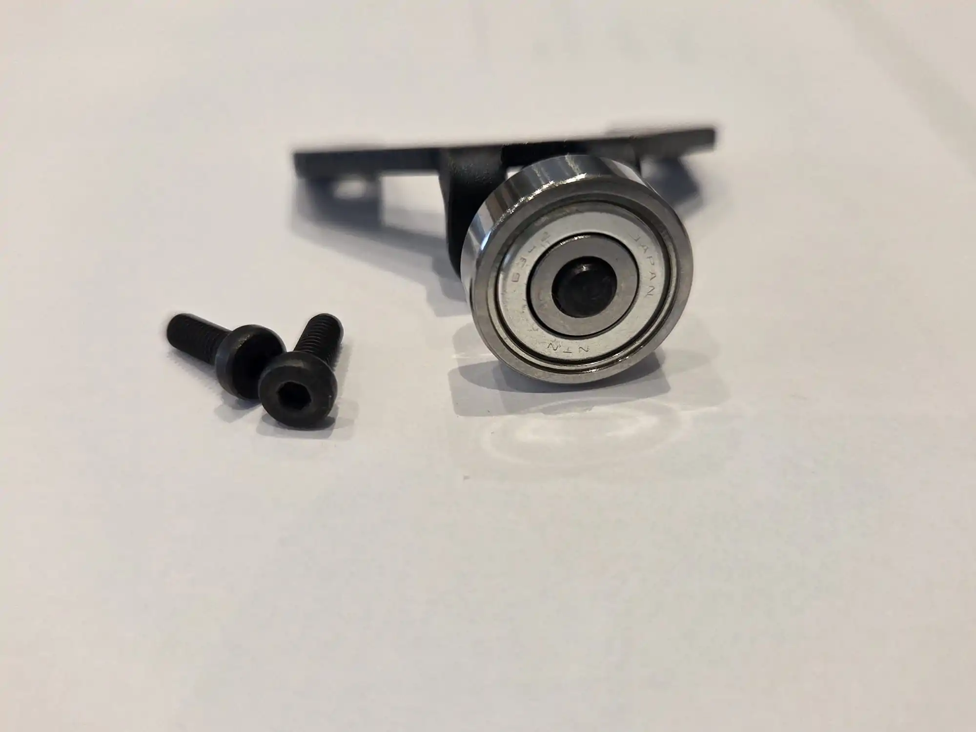 Take-Up Lever Hold Release Bracket Ass'y